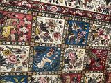 an image of a very large oriental rug on display