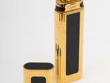 a close up of a lighter on a white surface with a lighter in the foreground