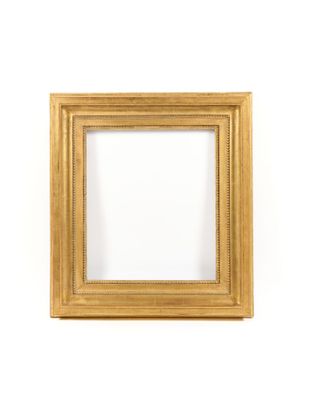 a gold frame on a white wall with a white background