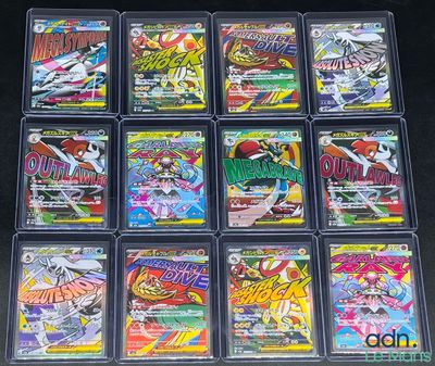a close up of a collection of pokemon trading cards in plastic cases