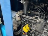 a machine that is sitting inside of a blue container