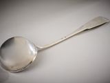 a spoon that is sitting on a table