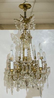 a chandelier hanging from the ceiling in a room