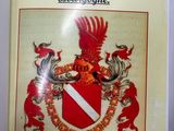 la couverture d'un livre sur laquelle figure une image représentant des armoiries