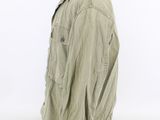 an olive green jacket on a mannequin mannequin mannequin mannequin mannequin mannequin mannequin mannequin manne