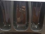 a box with three empty glasses inside of it
