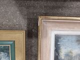 two paintings on the wall next to each other
