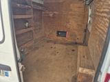 an image of a small room with a toilet in it