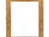 an old gold frame with a white background