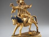 an image of a statue of a man riding on a horse