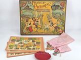 an image of a box of princesses and prince playing a board game