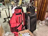 two bags of golf balls and a bag of golf clubs on the floor