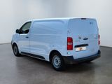 a picture of a white van parked in a room