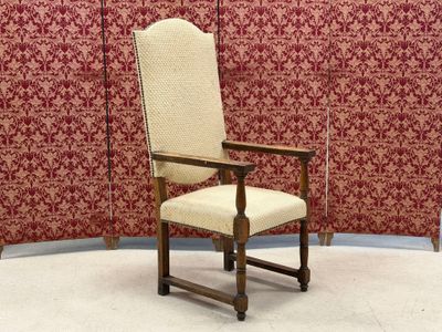 a chair that is sitting in front of a wall