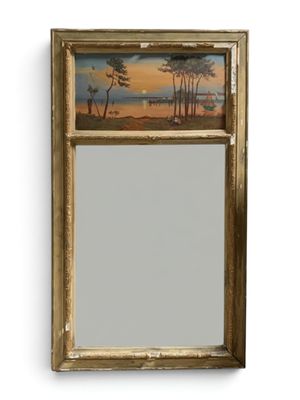 une image représentant un miroir sur lequel est peint un paysage