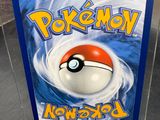 a close up of a box with a pokemon toy inside of it