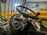 a close up of the steering wheel of a bus