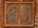a picture of an old window with graffiti on it