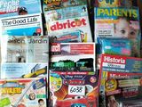 a lot of children ' s books and toys in a box