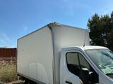 a white truck that is parked in a lot