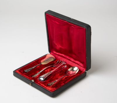 a red case with silverware in it on a white surface