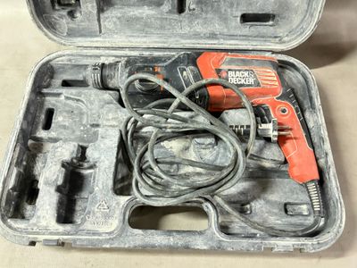 two tools in a case that are sitting on a table