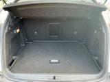 a trunk of a car with the back door open
