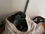 a bag of items that is sitting on the floor