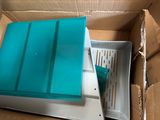 a box that has a blue lid on top of it