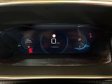 the dashboard of a car with a digital display on it