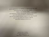 a plaque on the wall of a building with a poem written on it