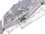 an image of a close up of a wrist watch on a white surface