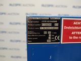 a picture of a sign on the side of a machine