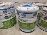 several rolls of blue and white tape sitting on top of a counter