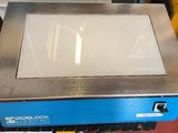 an image of a close up of a counter top oven on a table