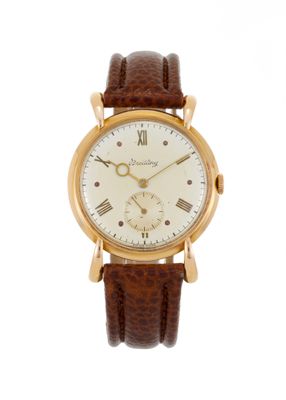 gros plan d'une montre sur fond blanc