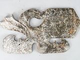 two pieces of metal on a white surface