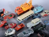 a lot of toy cars that are sitting on a table