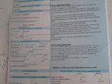 a lot of papers on the table with a lot of things on it