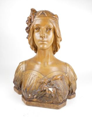 buste en bronze représentant une femme en robe, avec des fleurs sur la tête