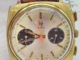 an image of a close up of a wrist watch on a table