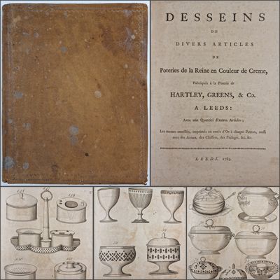 un vieux livre sur lequel figure l'image d'un tas de plats