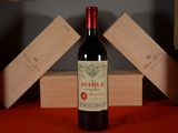 a bottle of wine that is sitting on a table
