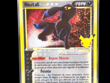 a close up of a pokemon card on a black background