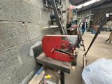 a machine that is sitting on the steps in a building