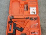 a tool in a case that is sitting on the floor