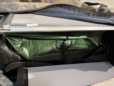 a laptop in the back of a bag with a laptop in it