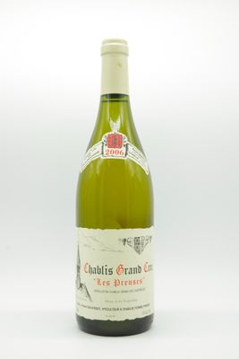 a bottle of wine that is sitting on a table