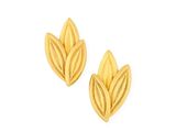 a pair of gold leaf shaped earrings on a white background