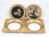two gold plate holders with pictures of a woman and a child on them